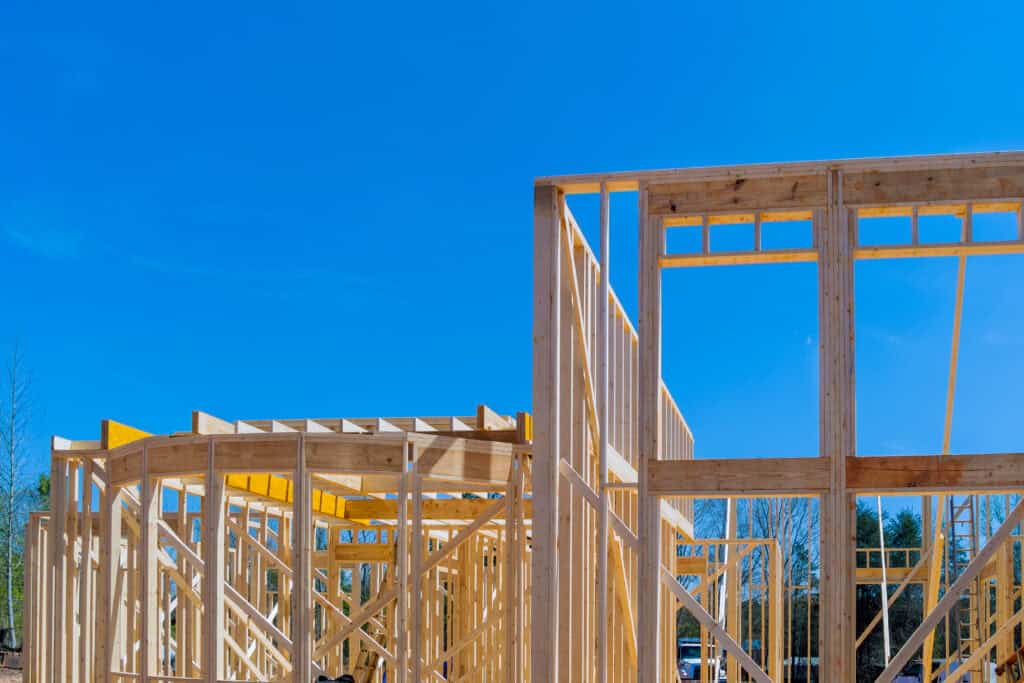 Wooden house frame under construction in Rancho Santa Fe.