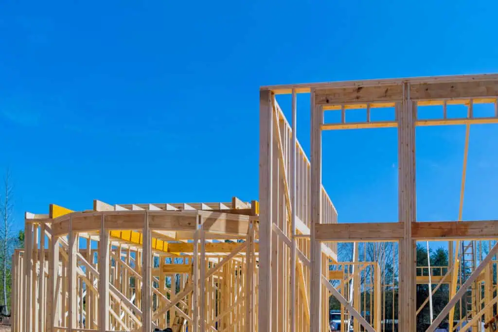 Wooden house frame under construction in Rancho Santa Fe.